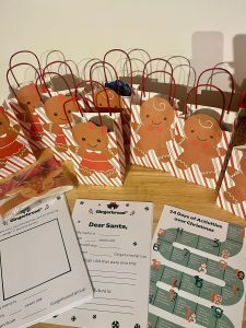 Photo of gingerbread themed goodie bags as well as Christmas activities